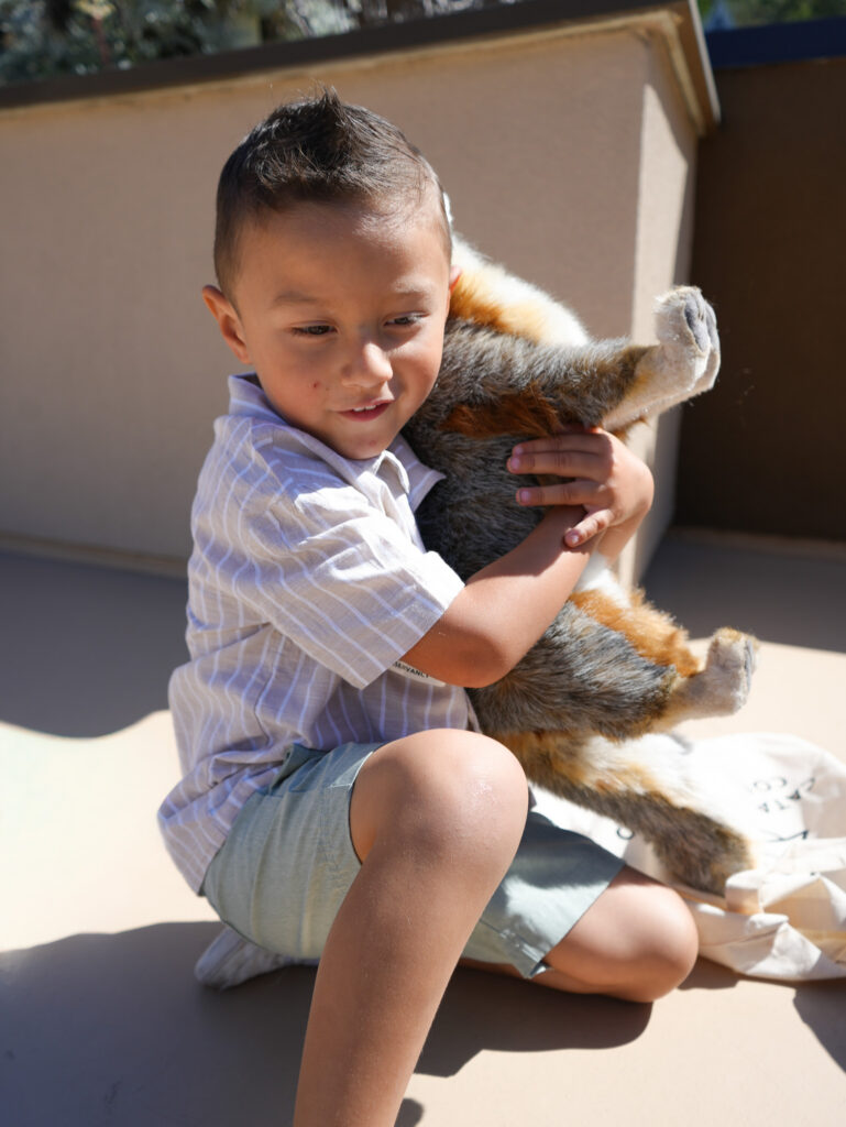 Julian and fox mascot on Catalina Island